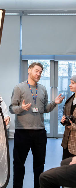 Photography lecturer and students in Digital Studio